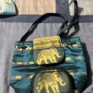 Mini backpack  with elephant design enough room for a few essentials like phone.